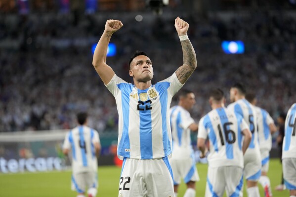 Lautaro Martínez scores twice and Argentina playing without Messi beats  Peru 2-0 to end group play | AP News