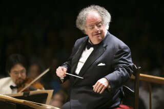 
              FILE - In this July 7, 2006 file photo, Boston Symphony Orchestra music director James Levine conducts the symphony on its opening night performance at Tanglewood in Lenox., Mass. New York's Metropolitan Opera says it will investigate allegations that its longtime conductor, Levine, sexually abused a teenager in the mid-1980s. Details of the police report were first reported Saturday, Dec. 2, 2017, on the New York Post website. Levine, 74, stepped down as music director of the Met in April 2016. (AP Photo/Michael Dwyer, File)
            