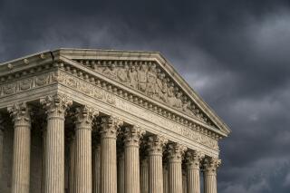 FILE - In this June 20, 2019, file photo, the Supreme Court is seen in Washington as a storm rolls in. (AP Photo/J. Scott Applewhite, File)