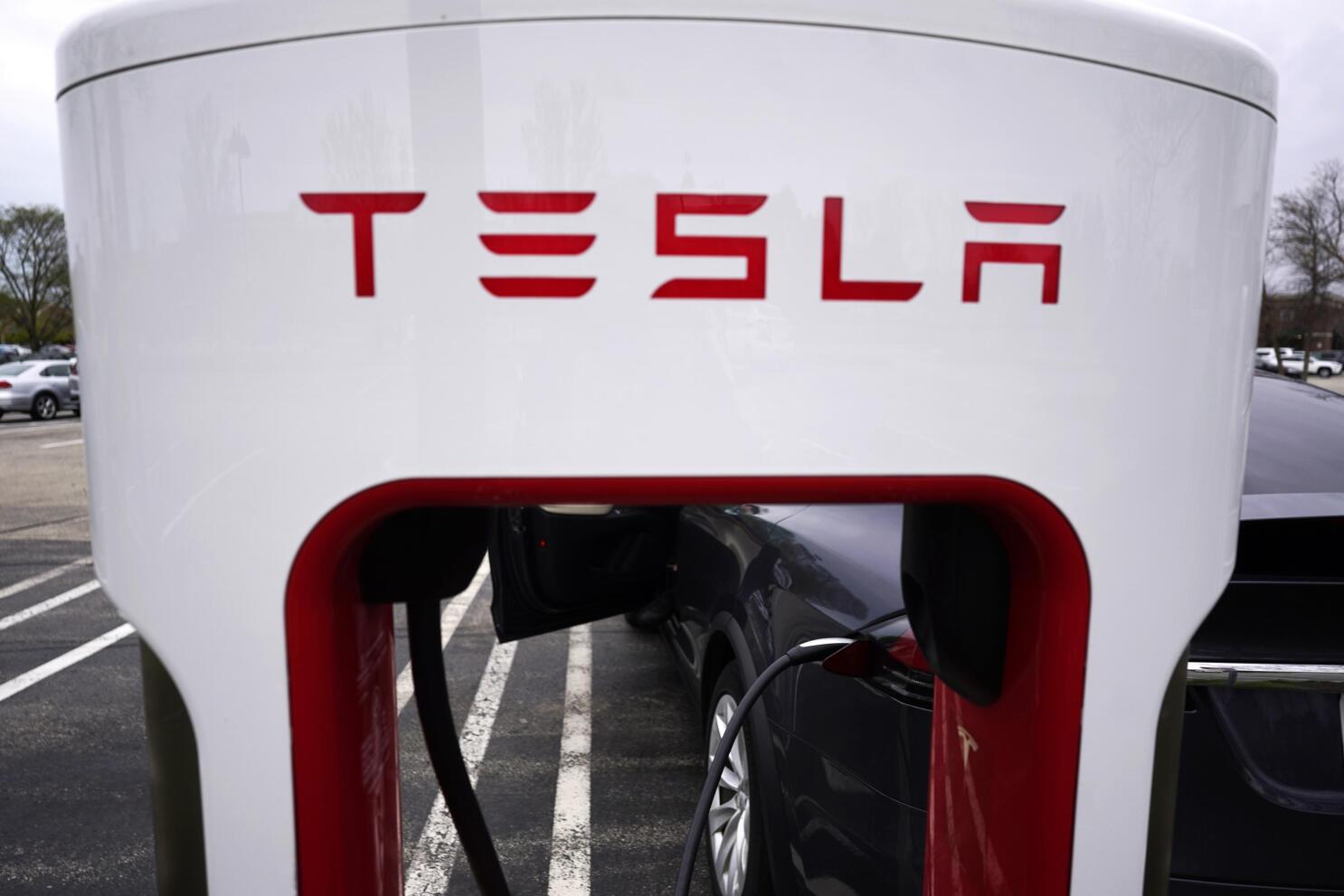 Competitors chip away at Tesla's US electric vehicle share | AP News