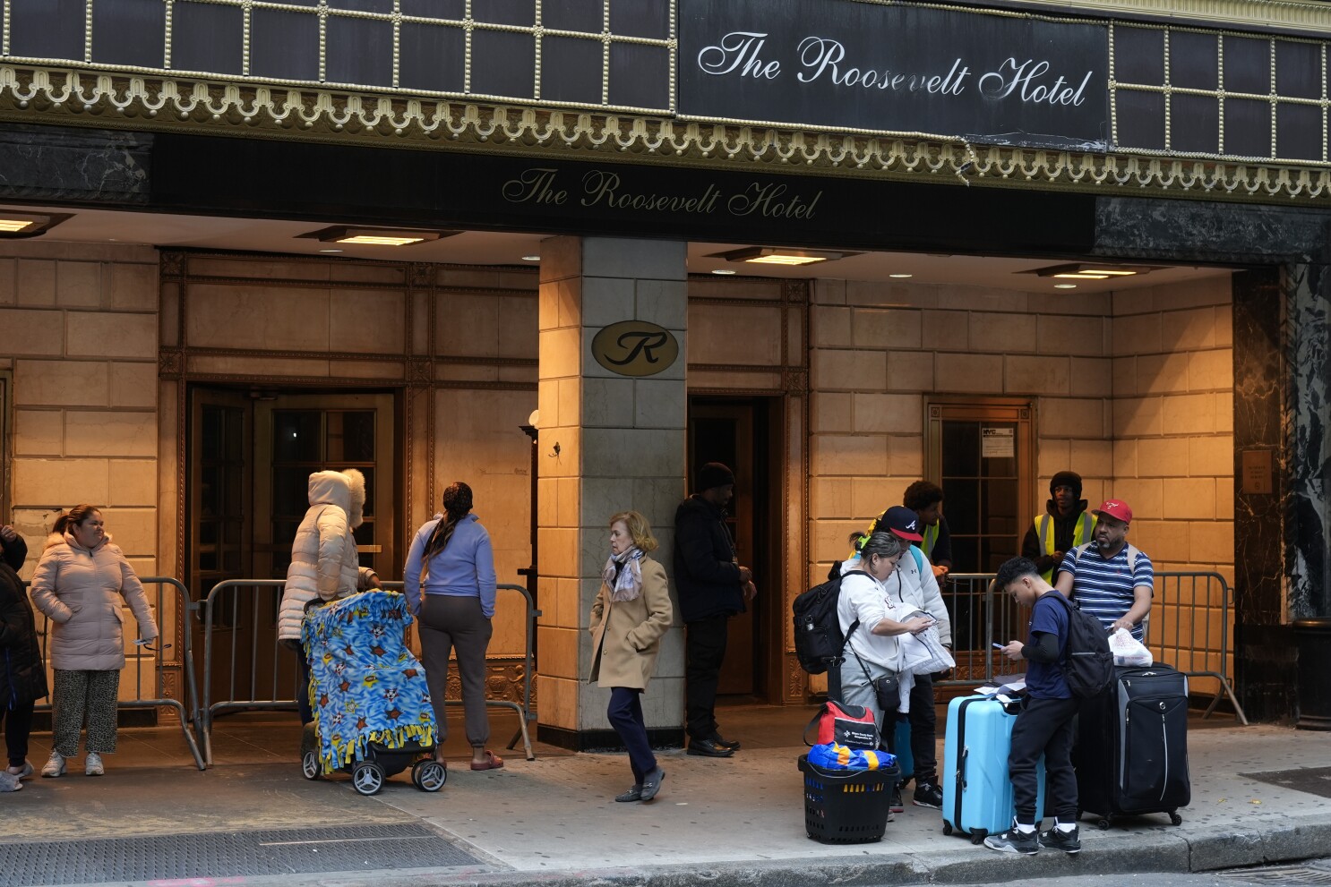 New York City closes arrival center for migrants in once grand Manhattan hotel