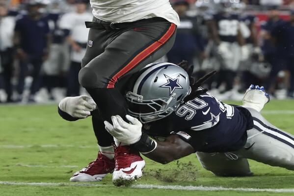 Tampa Bay Buccaneers tight end Rob Gronkowski (87) beats Dallas Cowboys defensive end DeMarcus Lawrence (90) to the endzone to score on an 11-yard touchdown reception during the second half of an NFL football game Thursday, Sept. 9, 2021, in Tampa, Fla. (AP Photo/Mark LoMoglio)
