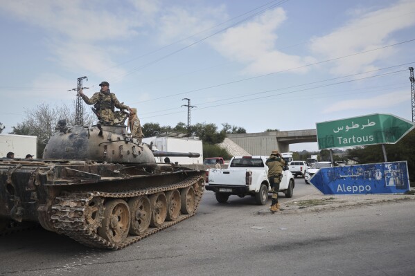 Reinforcement Syrian security forces deploy in the outskirts of Latakia, Syria, Friday, March 7, 2025. (AP Photo/Omar Albam, File)