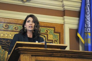 In this Jan. 23, 2019, photo, Gov. Kristi Noem gives her first budget address to lawmakers at the state Capitol in Pierre, S.D. Noem reiterated her opposition Tuesday to legalizing industrial hemp production in South Dakota, even in the face of new federal rules allowing the cash crop. (AP Photo/James Nord, File)