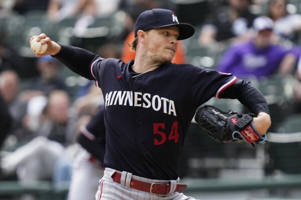 Minnesota Twins starting pitcher Sonny Gray throws against the Chicago White Sox during the first inning of a baseball game in Chicago, Sunday, Sept. 17, 2023. (AP Photo/Nam Y. Huh)