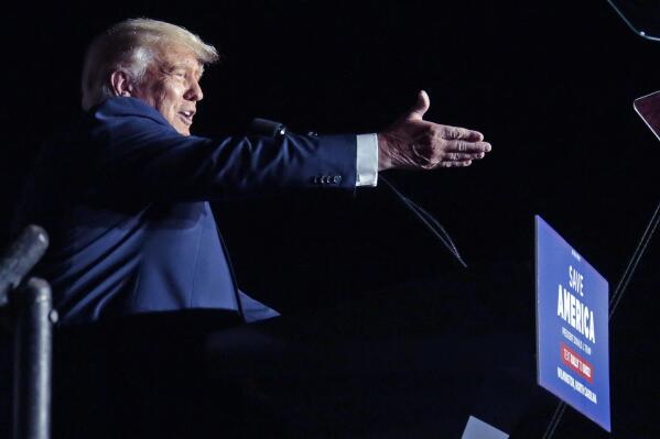 FILE - Former President Donald Trump speaks at a rally, Friday, Sept. 23, 2022, in Wilmington, N.C. On Monday, Oct. 24, 2022, Trump’s company goes on trial in a criminal tax case and the first task facing the court is a big one: Picking a neutral jury. (AP Photo/Chris Seward, File)
