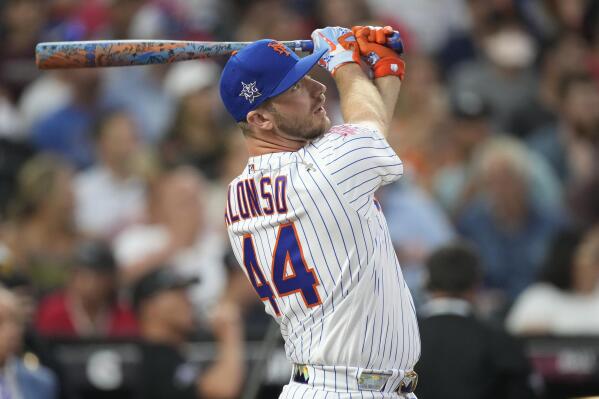 National League's Pete Alonso, of the New York Mets, hits during the second round of the MLB All Star baseball Home Run Derby, Monday, July 12, 2021, in Denver. (AP Photo/David Zalubowski)