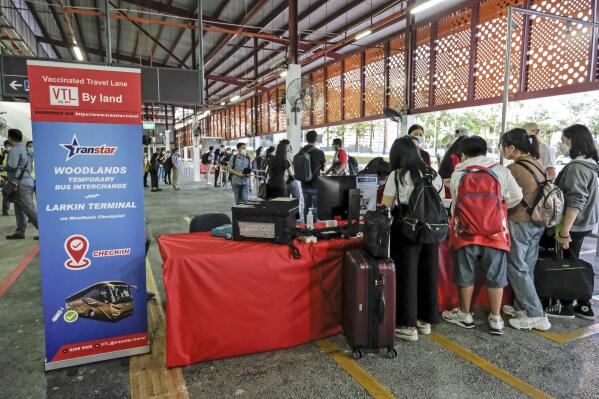 Joyful reunions as Malaysia-Singapore land border reopens
