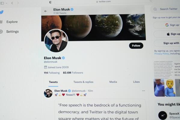 FILE - The Twitter page of Elon Musk is seen on the screen of a computer in Sausalito, Calif., on Monday, April 25, 2022.  Elon Musk wants to change how Twitter doles out its checkmark badges for verified accounts. While the “blue check” is at times viewed as an elite status symbol for the rich and famous, its purpose has always been to ensure that the people and accounts tweeting are who they say they are. (AP Photo/Eric Risberg, File)