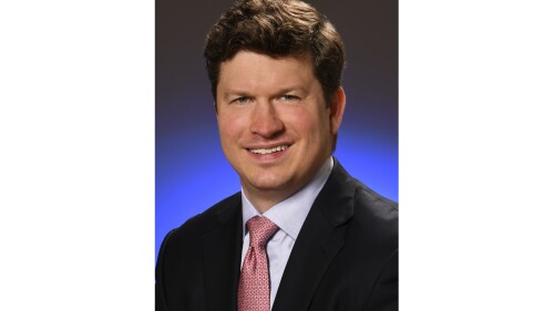 This image provided by the North American Securities Administrators Association shows Andrew Hartnett, president of the North American Securities Administrators Association, a group devoted to protecting investors. He is also deputy commissioner in the Iowa insurance Division. (North American Securities Administrators Association via AP)