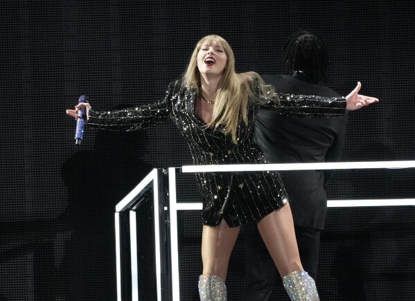 Taylor Swift performs during "The Eras Tour," Monday, Aug. 7, 2023, at SoFi Stadium in Los Angeles. (AP Photo/Chris Pizzello)