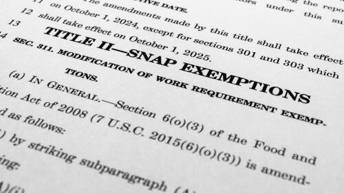 FILE - The draft of a bill that President Joe Biden and House Speaker Kevin McCarthy of Calif., negotiated to raise the nation's debt ceiling, is photographed Monday, May 29, 2023. Democrats are deeply conflicted about the food aid requirements President Joe Biden negotiated as part of the debt-ceiling deal. They fear damage has been done to safety net programs that will be difficult to unravel as Republicans demand further cuts.(AP Photo/Jon Elswick, File)