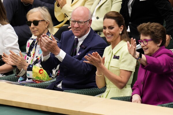 Kate, Princess of Wales sits in the Royal Box with tennis legends Billie Jean King, right, Martina Navratilova and AELTC chairman Ian Hewitt ahead of the final of the women's singles between the Czech Republic's Marketa Vondrousova and Tunisia's Ons Jabeur on day thirteen of the Wimbledon tennis championships in London, Saturday, July 15, 2023. (AP Photo/Kirsty Wigglesworth)