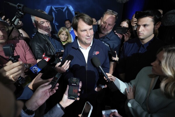 Jim Farley, President and Chief Executive Officer, Ford Motor Company speaks to reporters about the UAW contract talks at the North American International Auto Show in Detroit, Wednesday, Sept. 13, 2023. (AP Photo/Paul Sancya)