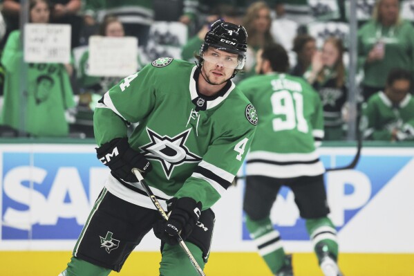 Dallas Stars defenseman Miro Heiskanen warms up before Game 4 of a second-round NHL hockey playoff series against the Winnipeg Jets in Dallas, Tuesday, May 13, 2025. (AP Photo/Gareth Patterson)