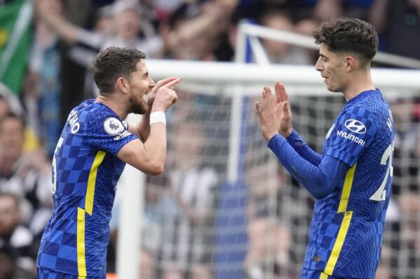 Chelsea's Kai Havertz, right, celebrates with Chelsea's Jorginho at the end of the English Premier League soccer match between Chelsea and Newcastle United at Stamford Bridge stadium in London, Sunday, March 13, 2022. (AP Photo/Kirsty Wigglesworth)