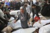 Palestinians mourn their relatives killed in the Israeli bombardment of the Gaza Strip in Rafah, Tuesday, Nov. 7, 2023. (AP Photo/Hatem Ali)