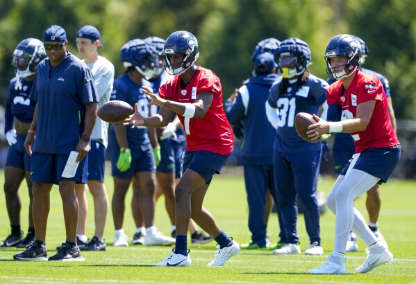 Geno Smith and Drew Lock competing for the Seahawks' starting QB role 