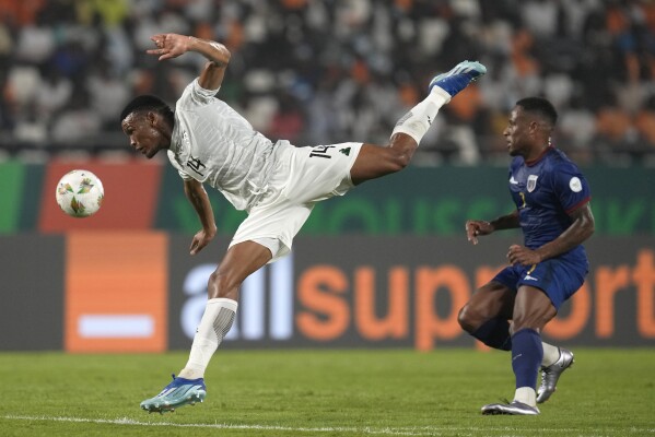 South Africa's Mothobi Mvala, left, heads the ball as he defends against Cape Verde's Jovane Cabral during the African Cup of Nations quarter final soccer match between Cape Verde and South Africa, at the Charles Konan Banny stadium in Yamoussoukro, Ivory Coast, Saturday, Feb. 3, 2024. (APPhoto/Themba Hadebe)