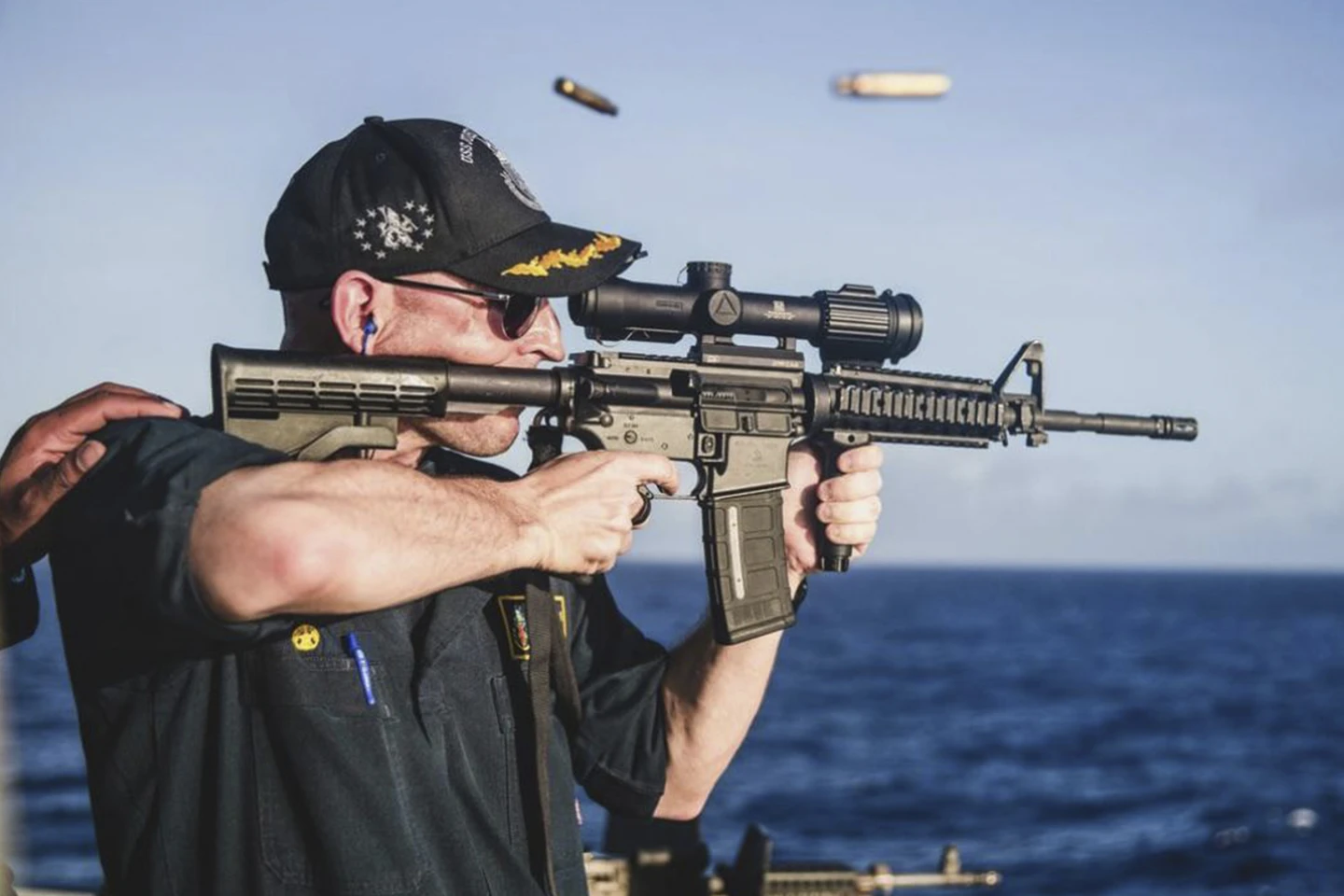 Navy Commander Relieved of Duty After Photo Showed Him Firing Rifle with Scope Backward