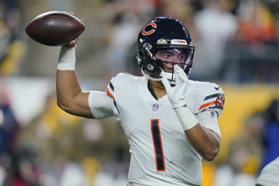 FILE - Chicago Bears quarterback Justin Fields passes against the Pittsburgh Steelers during the first half of an NFL football game, Monday, Nov. 8, 2021, in Pittsburgh. The Bears traded Fields to the Steelers on Saturday, March 16, 2024, according to a person informed of the deal. (AP Photo/Gene J. Puskar, File)