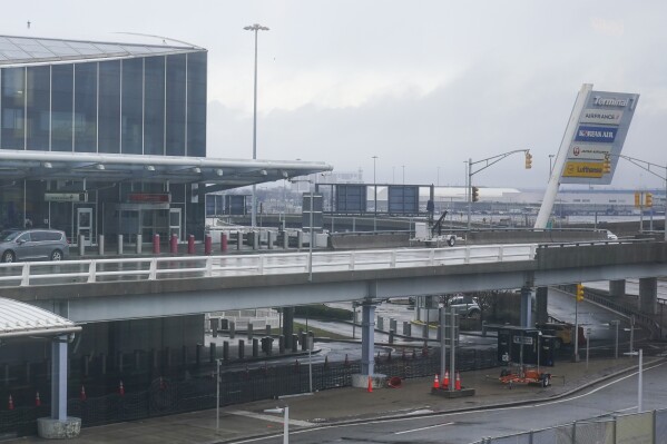 A vehicle stops at Terminal 1 at John F. Kennedy International Airport in New York, Feb. 17, 2023. (AP Photo/Seth Wenig, File)