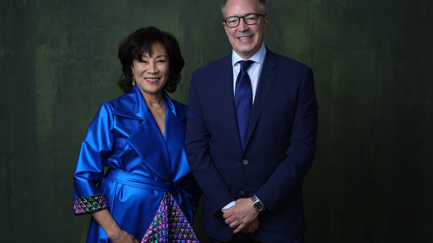 President of the Academy of Motion Picture Arts and Sciences Janet Yang, left, and CEO of the Academy of Motion Picture Arts and Sciences Bill Kramer poses for a portrait during the 96th Academy Awards Oscar nominees luncheon on Monday, Feb. 12, 2024, at the Beverly Hilton Hotel in Beverly Hills, Calif. (AP Photo/Chris Pizzello)