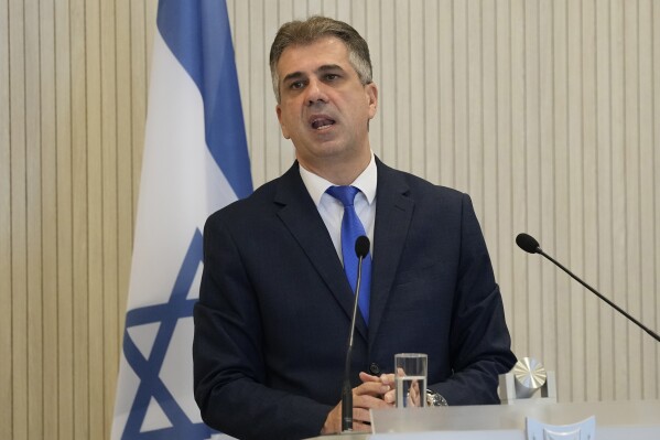 FILE - Israeli Foreign Minister Eli Cohen talks to the media during a press conference after a meeting with his Cyprus' counterpart Constantinos Kombos and Greek counterpart Nikos Dendias at the Presidential palace in capital Nicosia, Cyprus, on March 31, 2023. The Israeli and Libyan foreign ministers met secretly in Italy last week, Israel’s Foreign Ministry announced Sunday, Aug. 27, 2023 in what it said was the first-ever meeting between the country’s top diplomats. (AP Photo/Petros Karadjias, File)