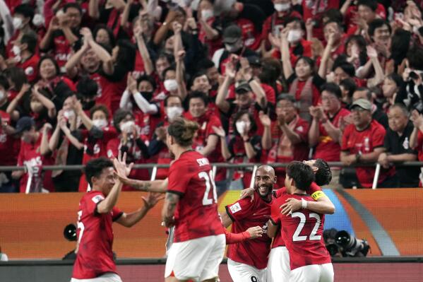 Players of Saudi Arabia's Al Hilal react after their team was defeated by  Japan's Urawa Red Diamonds after the AFC Champions League final match at  Saitama Stadium in Saitama, near Tokyo, Saturday