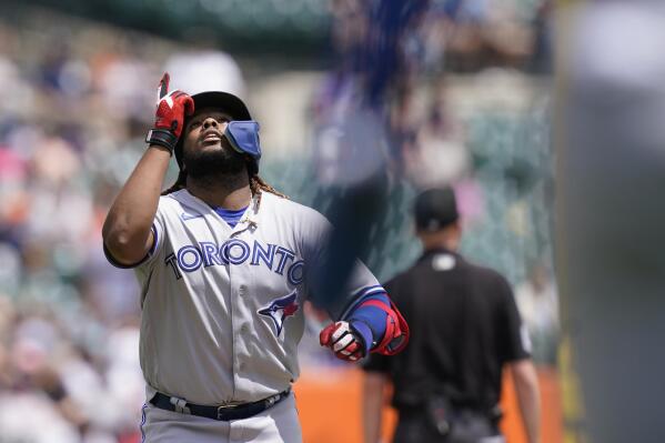 Toronto Blue Jays' Vladimir Guerrero Jr. looks skyward as he crosses home plate after his two-run home run during the fourth inning of a baseball game Detroit Tigers, Sunday, June 12, 2022, in Detroit. (AP Photo/Carlos Osorio)