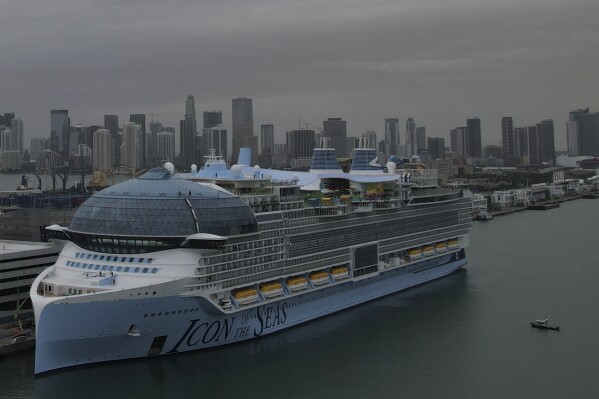 FILE - The Icon of the Seas, the world's largest cruise ship, sits docked after arriving to its home port in Miami, Wednesday, Jan. 10, 2024. Royal Caribbean’s Icon of the Seas is leaving South Florida on Saturday, Jan. 27, for its first seven-day island-hopping voyage through the tropics. (AP Photo/Rebecca Blackwell, File)