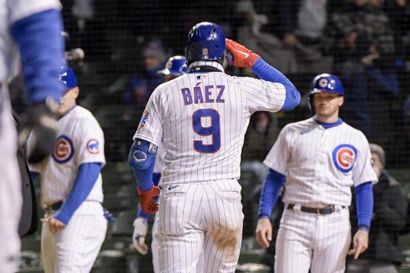 Chicago Cubs' Javier Baez bats during the fourth inning against