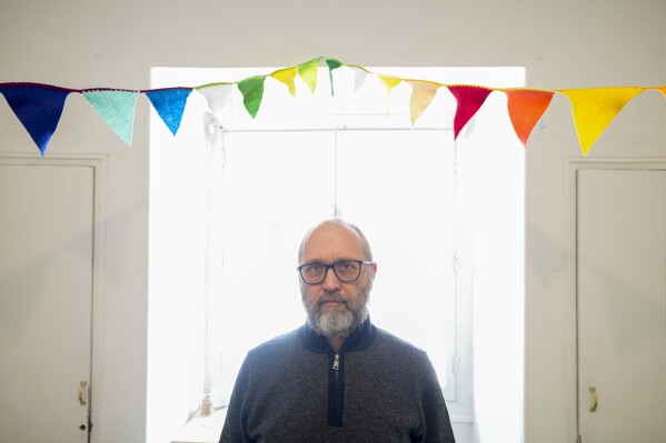 Helmut Kramer poses for a portrait in Santiago, Chile, Thursday, July 27, 2023. Kramer, 53, said he was sexually abused at age 12 in a Jesuit school in Antofagasta, a city in northern Chile. (AP Photo/Esteban Felix)