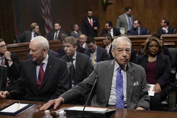 
              Senate Judiciary Committee Chairman Sen. Charles Grassley, R-Iowa, right, and Sen. Orrin Hatch, R-Utah, wait for the committee's ranking member, Sen. Dianne Feinstein, D-Calif. on Capitol Hill in Washington, Monday, March 27, 2017. Senate Democrats forced a one-week delay in a committee vote on President Donald Trump's Supreme Court nominee, who remains on track for confirmation with solid Republican backing.  (AP Photo/J. Scott Applewhite)
            
