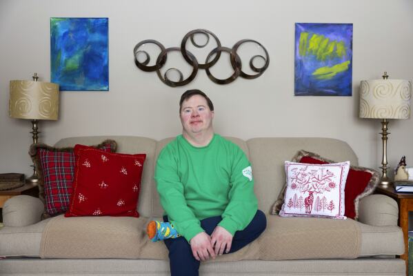 Paul Safarik, 32, is photographed in his home on Wednesday, Feb. 12, 2025, in Lincoln, Neb.(AP Photo/Rebecca S. Gratz)