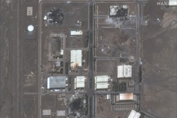 This satellite image provided by Maxar Technologies shows the Natanz nuclear enrichment facility, where multiple buildings were destroyed from recent Israeli airstrikes, 135 miles southeast of Tehran, Iran, Saturday, June 14, 2025. (Maxar Technologies via AP)