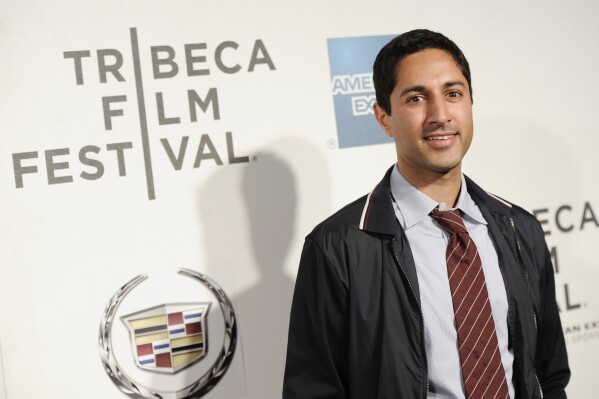 FILE - Actor Maulik Pancholy attends the premiere of "Trishna" during the 2012 Tribeca Film Festival on Friday, April 27, 2012 in New York. The school board has reversed it's decision to cancel an upcoming speech by Pancholy due to concerns about what they described as his activism and “lifestyle.” The board voted 5-4, Wednesday, April 24, 2024, to allow Pancholy to speak at assembly next month where he will speak out against bullying.(AP Photo/Evan Agostini, File)