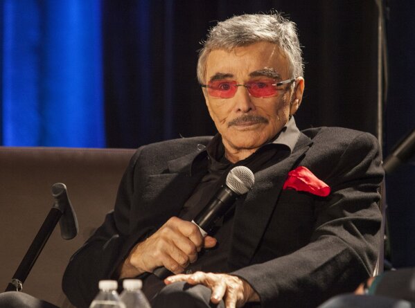 
              FILE - In this Aug. 22, 2015 file photo, Burt Reynolds appears at the Wizard World Chicago Comic-Con in Chicago. Reynolds, who starred in films including "Deliverance," "Boogie Nights," and the "Smokey and the Bandit" films, died at age 82, according to his agent. (Photo by Barry Brecheisen/Invision/AP, File)
            