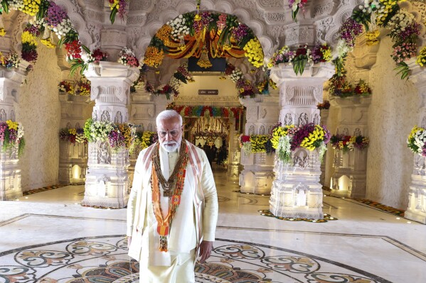 In this photograph released by Indian Government Press Information Bureau, Indian Prime Minister, walks after leading the opening of a temple dedicated to Hinduism’s Lord Ram in Ayodhya, India, Monday, Jan. 22, 2024. (Press Information Bureau via AP)