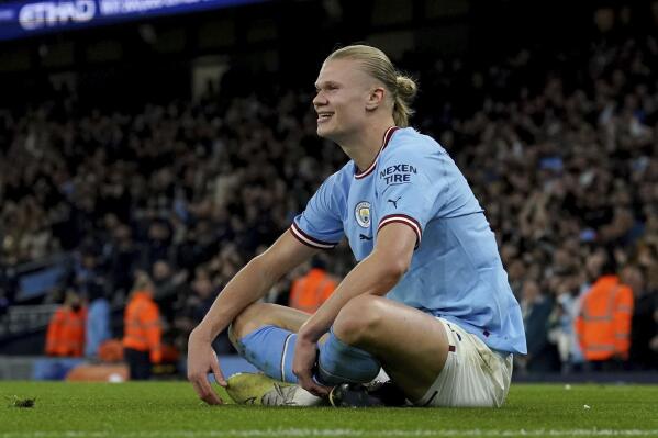 Manchester City's Erling Haaland celebrates after scoring his side's second goal during the English Premier League soccer match between Manchester City and West Ham United at Etihad stadium in Manchester, England, Wednesday, May 3, 2023. (Martin Rickett/PA via AP)
