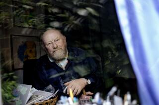 FILE - In this June 6, 2010 file photo, Danish cartoonist Kurt Westergaard is seen at his home near Aarhus, Denmark.  Danish cartoonist Kurt Westergaard, whose image of the Prophet Muhammad wearing a bomb as a turban was at the center of widespread anti-Danish anger in the Muslim world in the mid-2000s, has died aged 86, Westergaard’s family announced Sunday July 18, 2021. (Peter Hove Olsen / Polfoto via AP, file)