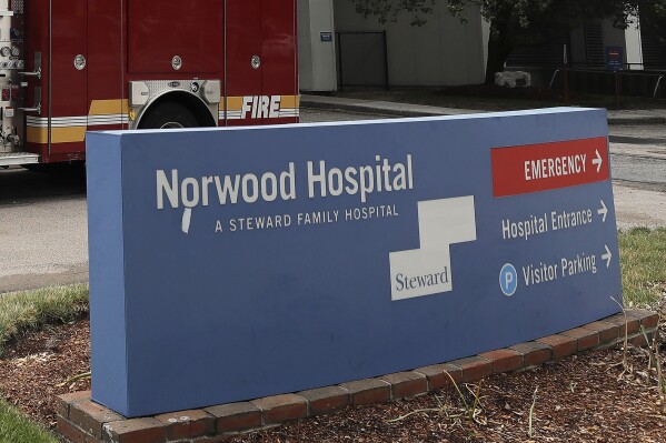 FILE - The sign for Norwood Hospital, a Steward Health Care hospital, is seen, June 29, 2020, in Norwood, Mass. Steward Health Care said it plans to sell off all its hospitals after announcing on Monday, May 6, 2024, that it filed for bankruptcy protection. (AP Photo/Steven Senne, File)