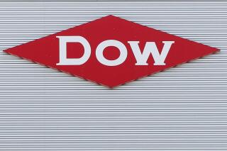 FILE - This Aug. 2, 2019, photo shows the Dow corporate logo in Midland, Mich. Dow is cutting about 2,000 jobs, or approximately 5% of its global workforce, Thursday, Jan. 26, 2023, as part of an effort to reach $1 billion in cost savings this year. (AP Photo/Paul Sancya, File)