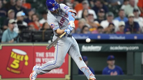 New York Mets' Pete Alonso hits a two-run home run against the Houston Astros during the sixth inning of a baseball game Wednesday, June 21, 2023, in Houston. (AP Photo/David J. Phillip)