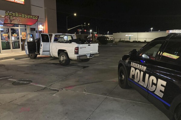 This photo provided by the Anderson Police Department shows a pick-up driven by a woman who had abducted her children in Arkansas. The photo was taken in Saturday, Oct. 21, 2023 in Anderson, Calif. Authorities say they rescued eight children after they had allegedly been abducted by their biological mother from their foster homes in Arkansas. (Anderson Police Dept. via AP)