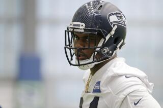 FILE - In this May 12, 2017, file photo, defensive tackle Malik McDowell, the Seattle Seahawks' top draft pick, watches a drill during NFL football rookie minicamp in Seattle. The Cleveland Browns are giving McDowell the chance to revive an NFL career stopped by some serious legal trouble. (AP Photo/Ted S. Warren, File)