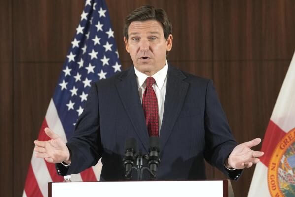 Governor Ron DeSantis gestures during a news conference where he spoke of new law enforcement legislation that will be introduced during the upcoming session, Thursday, Jan. 26, 2023, in Miami. (AP Photo/Marta Lavandier)