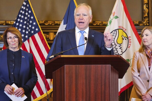 Gov. Tim Walz and leaders of the Minnesota Legislature announce a budget deal during a news conference at the state Capitol on Thursday, May 15, 2025, in St. Paul, Minn. (AP Photo/Steve Karnowski)