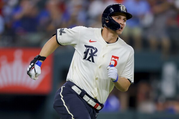 García's homer in 10th gives Rangers 7-5 win over Astros