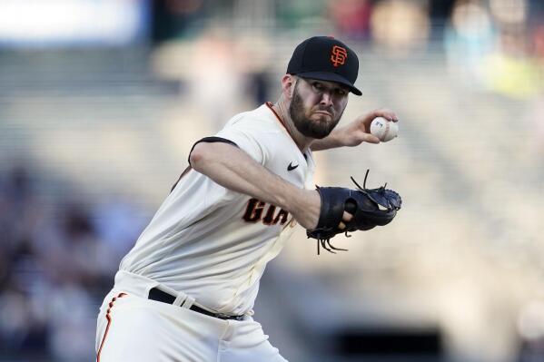San Francisco Giants' Alex Wood pitches against the Arizona Diamondbacks during the first inning of a baseball game in San Francisco, Monday, June 14, 2021. (AP Photo/Jeff Chiu)